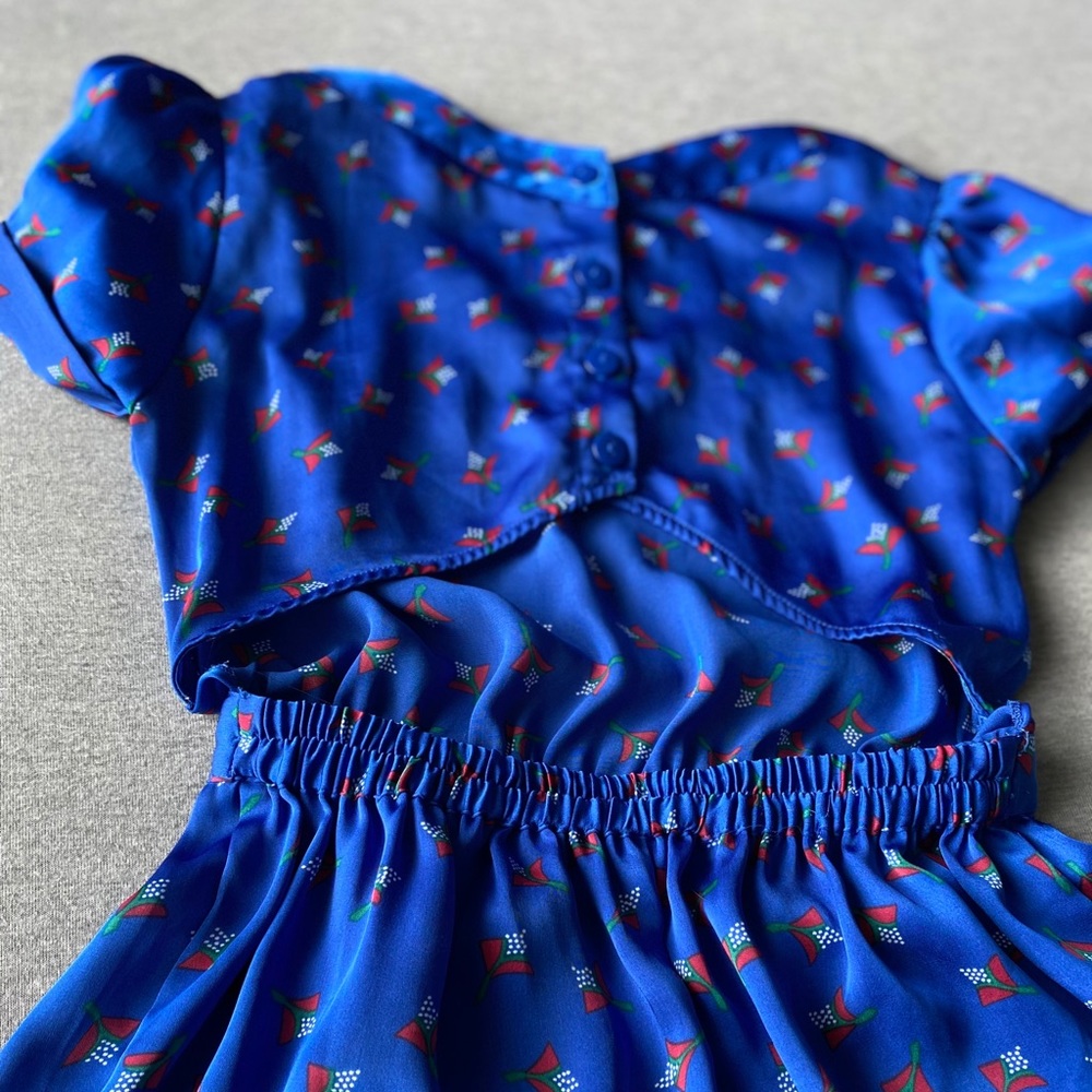 silky blue open back pleated dress